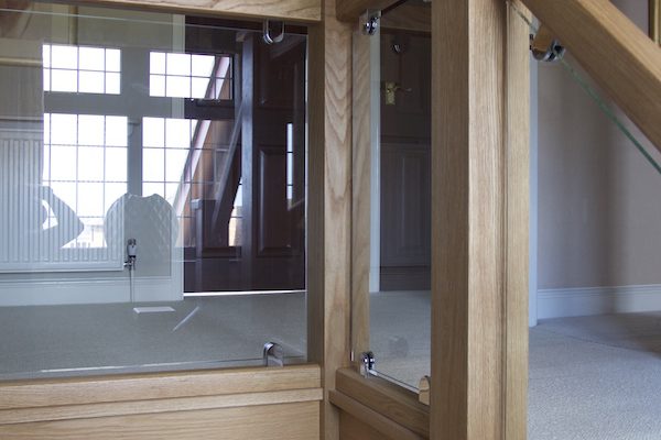 Oak and glass staircase transformation in Burbage