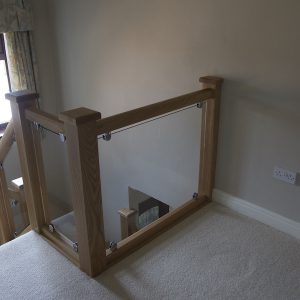 Oak and glass staircase transformation in Burbage